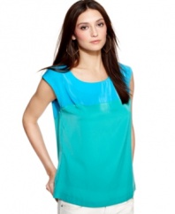 Colorblocked details and a chunky zipper at the back lend modern attitude to this blouse by Kut from the Kloth.