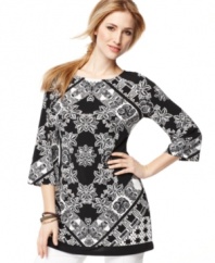 An alluring scarf-style print updates Style&co.'s classic three quarter sleeve jersey tunic. Add pop with colorful bangles or sparkling earrings! (Clearance)