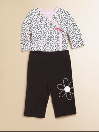 Bold, beautiful daisies adorn the bodysuit and pants of this plush cotton two-piece set with snaps and and elastic waistband. Bodysuit V-neckLong sleevesFront snapsBottom snaps Pants Elastic waistbandCuffed hemCottonMachine washImported Please note: Number of buttons/snaps may vary depending on size ordered. 