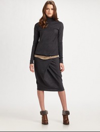 Finespun stretch wool, finished with a flattering drop waist and an architectural tuck detail.TurtleneckLong sleevesDrop waistFoldover skirt tuckAbout 25 from natural waist94% wool/6% elastaneDry cleanMade in ItalyModel shown is 5'11 (180cm) wearing US size Small. 