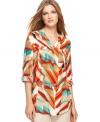 Color your winter wardrobe with this bright geometric-printed Calvin Klein tunic -- perfect for a pop of bold pattern!