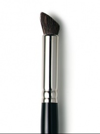Laura Mercier's all-natural brush for colour application and blending. To contour, place the flat side upward, point into the crease and use a windshield wiper motion. Choose long handle or travel size brush. Made in USA. 