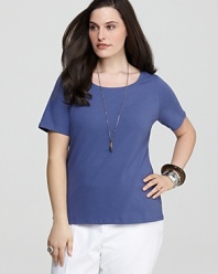 Touchably soft, this essential Eileen Fisher tee is styled with short sleeves and finished with a delicately scooped neckline.