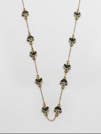 A charming piece with enamel accented stations on a link chain. EnamelGoldtoneLength, about 32Slip-on styleImported 