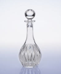 Dramatic cuts and a modern shape give this wine decanter a stunning flair. Topped by a beautiful crystal orb this decanter displays your fine wine in an equally fine setting. A wonderful gift for any oenophile.