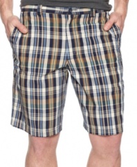 Stake your claim on summer style with these plaid flat-front shorts from Club Room.
