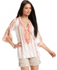 INC revamps the peasant top with sexy split sleeves, vibrant embroidery, shiny paillette details and a relaxed fit.