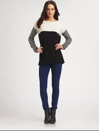 Slouchy-chic boatneck of wool and cashmere has dropped shoulders, long dolman sleeves and a modern colorblock pattern. BoatneckDropped shouldersLong dolman sleevesHi-low hem hits below the hips70% wool/30% cashmereDry cleanImportedModel shown is 5'10 (177cm) wearing US size Small.