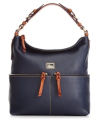The artisans at Dooney & Bourke have created the must-have silhouette of the season. Fashionable and functional with a go-anywhere attitude, this design combines beautifully textured grain leather with custom hardware and detail stitching, for a look that's altogether irresistible