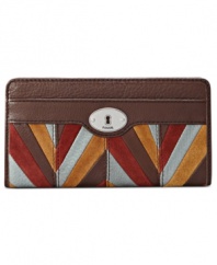 Take a patchwork approach to accessorizing with this leather clutch from Fossil that's at once refined and free-spirited. The well-organized interior provides plenty of pockets and compartments, so your everyday essentials are always easily at hand.