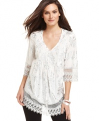 A metallic floral print adds shine to this Alfani tunic for a stylish summer look!
