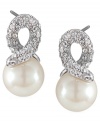 Add a simple twist. Carolee's elegant knot-shaped stud earrings feature a post backing with polished glass pearls and sparkling glass accents. Set in silver tone mixed metal. Approximate drop: 3/4 inch.