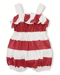 A pretty cotton jersey one-piece is designed for a preppy, nautical look with bold stripes and a ruffled neckline.