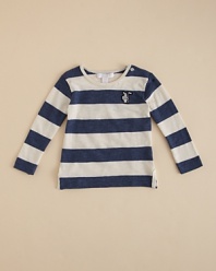 A longsleeve tee is rendered in wide rugby stripes and accented with buttons at the left shoulder.