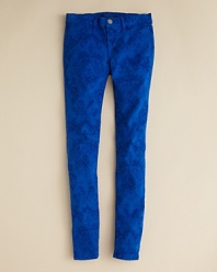 Beautifully detailed floral prints in tonal hues weave a touch of mystery into J Brand's Baroque print skinny jeans.