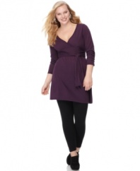 Looking super-cute is a cinch with Extra Touch's long sleeve plus size sweater dress, featuring a belted empire waist.