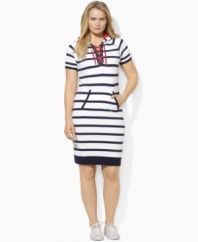Casual comfort meets effortless style in Lauren by Ralph Lauren's chic short-sleeved plus size dress, crafted from sleek stretch jersey with lace-up ties for a haute finishing touch.