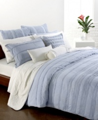 Slip into something a little more comfortable. Crafted from men's shirting material and garment washed for extra softness, this Pure DKNY Innocence Stripe duvet cover features cotton voile yarn-dyed stripes with mini-ruffles. Button closure.