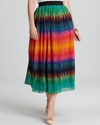 Enlivened by a vivid tie-dye print, this VINCE CAMUTO Plus maxi skirt infuses your look with a rush of bohemian spirit.