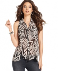The mixed tribal-inspired print adds subtle safari style to this GUESS? blouse that's on trend for summer!