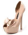 Slick and sky-high, STEVEN BY STEVE MADDEN's bow-topped platform pumps command attention.