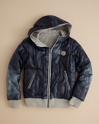 It's all about options. Diesel's Jachio jacket switches from a cool denim print to a solid sateen shell--2 distinct styles to complement his coolest outfits.