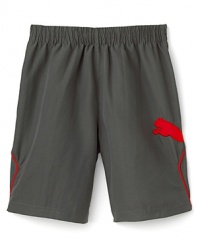 Contrasting piping details and the distinctive PUMA logo add a stylish accent to woven sport shorts.