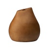 Smoothed to perfection by the hand of a master, this sophisticated vase embodies artisan texture and timeless design.