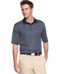 Play through. Make sure you're ready to keep the game going with this Greg Norman for Tasso Elba performance polo shirt featuring PlayDry® technology.