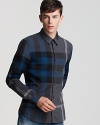 Burberry's larger-than-life check pattern makes an iconic statement on this modern, slim-fitting sport shirt.