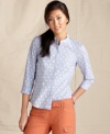 Jump into summer in Tommy Hilfiger's crisp button-front shirt, featuring ladylike eyelet embroidery. So sweet!
