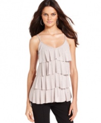 Flirty ruffles and edgy studs make an unexpectedly chic combination! Wear INC's tank as a layering piece or on its own.