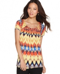 Try a touch of tribal print -- with a truly affordable price -- with Style&co.'s pleated top! The collar and sleeves create just the right amount of volume.