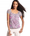 An intricate paisley print adorns INC's layered, lightweight mesh peasant top -- a must-have for warm weather!