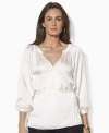 Decadent, rippling satin is luxuriously designed in a classic wrap silhouette with billowing sleeves to create a chic, contemporary essential from Lauren by Ralph Lauren.