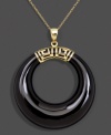 Let style come full circle in this elegant and timeless pendant. A cut-out onyx circle (30 mm) creates a bold statement in an intricate 14k gold setting. Approximate length: 18 inches. Approximate drop: 1-1/2 inches.