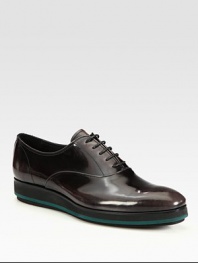 Cool, contrast sole enhances this sleek, leather lace-up style.Leather upperLeather liningRubber soleMade in Italy