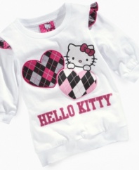 Hello Kitty pops up on the front of this argyle-print t-shirt, a dainty way to decorate her look.