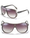 Alexander Mcqueen shield sunglasses with hematite skulls at temples, a rockstar style that is sure to turn heads.