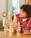 Sky high. Build elaborate castles with this 75-piece TreeHaus Solid wood castle block set for hours of imaginative fun.
