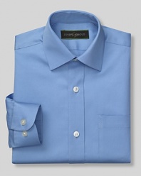 A touch finery for your growing boy, the classic dress shirt in blue, made with a little stretch that will move with him and retain its shape after washing.