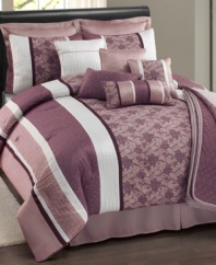 Prettier in purple! A lovely floral motif in an array of purple hues make this Ashely comforter set a sweet addition to any bedroom. Embellished with embroidered and pleated details for layers of dimension, these sets bring to mind an elegant setting.