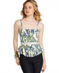 A lush landscape print adds femme appeal to a top washed in crochet knit trims and crisp pleats! From Jessica Simpson.