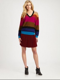 Bold colorblocked stripes give the right graphic punch to this soft wool pullover.V-neckDropped shouldersLong sleevesAbout 28 from shoulder to hemWoolDry cleanImportedModel shown is 5'10 (177cm) wearing US size Small.