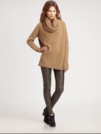 Slightly oversized and styled with a cozy cowlneck, all in a lush blend of wool, alpaca and camel.CowlneckDropped shouldersLong sleevesPullover style50% wool/20% nylon/20% alpaca/10% camelDry cleanImported of Italian fabricModel shown is 5'11 (180cm) wearing US size Small.