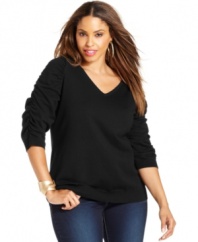 Who says basic has to mean boring? INC's plus size topper features fun raglan-seamed sleeves with dramatic ruching for a feminine touch.