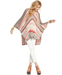 Go for a boho look this summer with this Free People striped poncho -- perfect for a beachside bonfire!