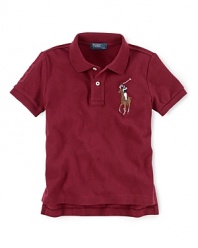A short-sleeved polo shirt is cut in soft, breathable cotton mesh with a multicolored Big Pony for a classic look.