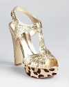 Covered in sparkling golden glitter, these GUESS sandals showcase a leopard print platform in luxe calf hair.