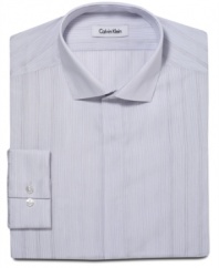 Fine lines. A subtle stripe and slim fit gives this Calvin Klein shirt an ultra-modern look.